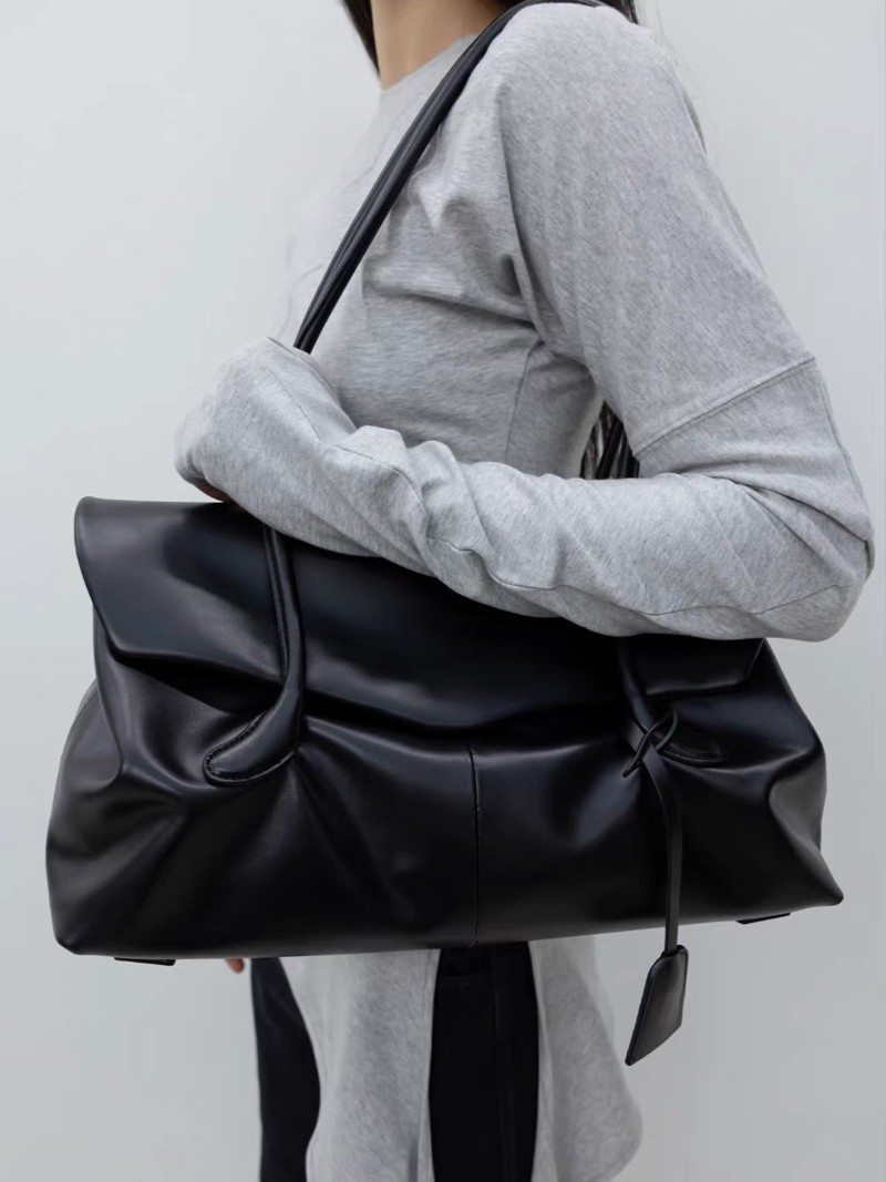 Merkontwerper Grote Capaciteit - Leatherwork Designs recensie en prijs