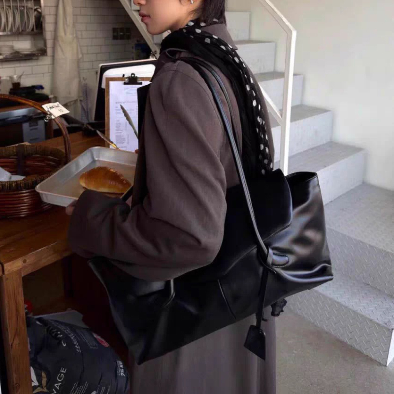 Merkontwerper Grote Capaciteit - Leatherwork Designs recensie en prijs